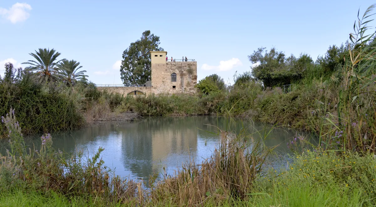 The old mill tower beside a pond at Tel Afek, Yarkon National Park